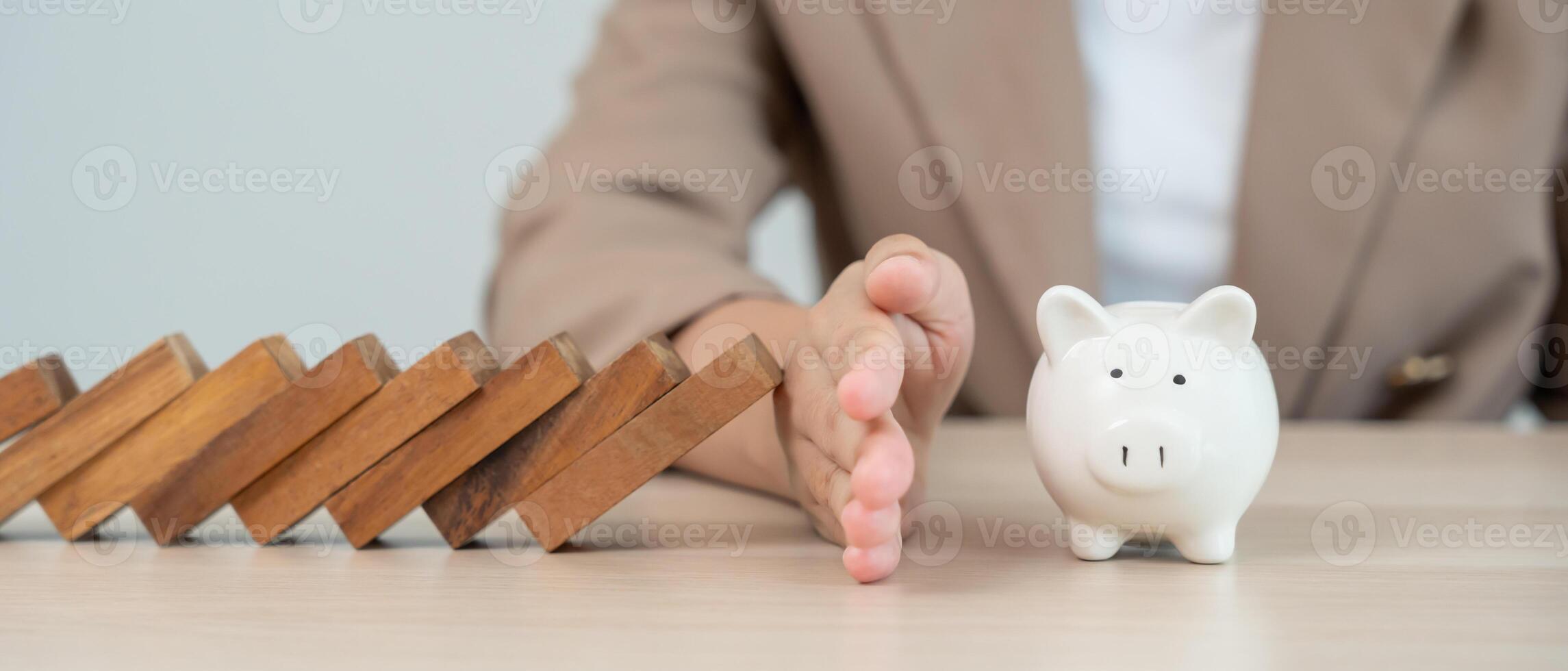insurance with hands protect domino. hands stop dominoes falling in business crisis. business risk control and planning and strategies to run prevent insurance businesses. save photo