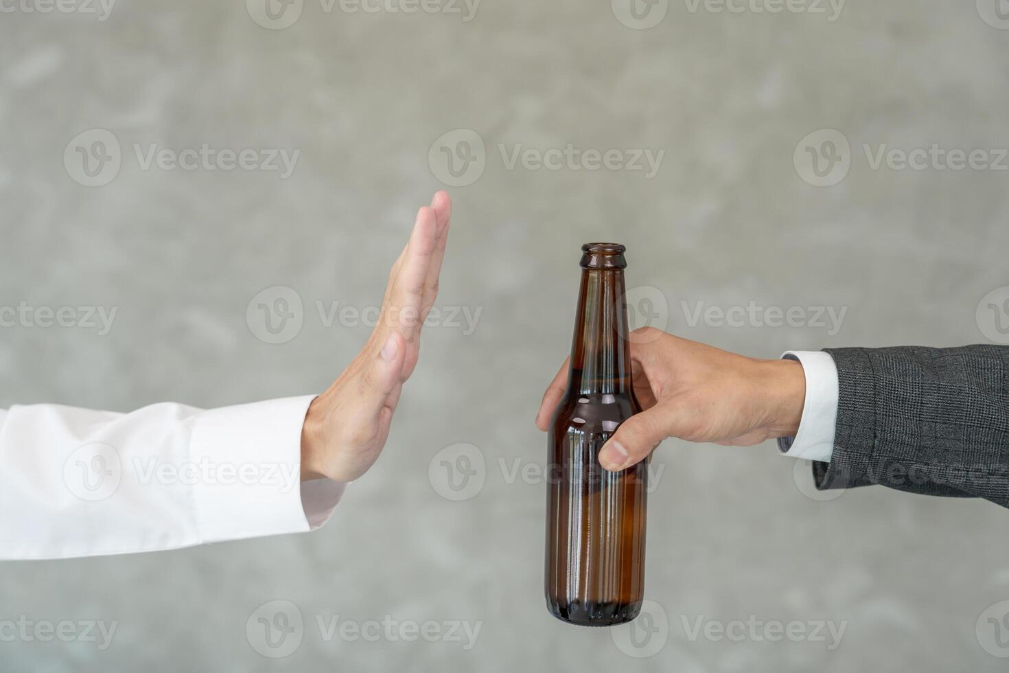 refuses say no and avoid to drink an alcohol, hand show reject and stopping, alcoholism treatment, alcohol addiction, quit booze, Stop Drinking Alcohol. Refuse bottle liquor, unhealthy photo