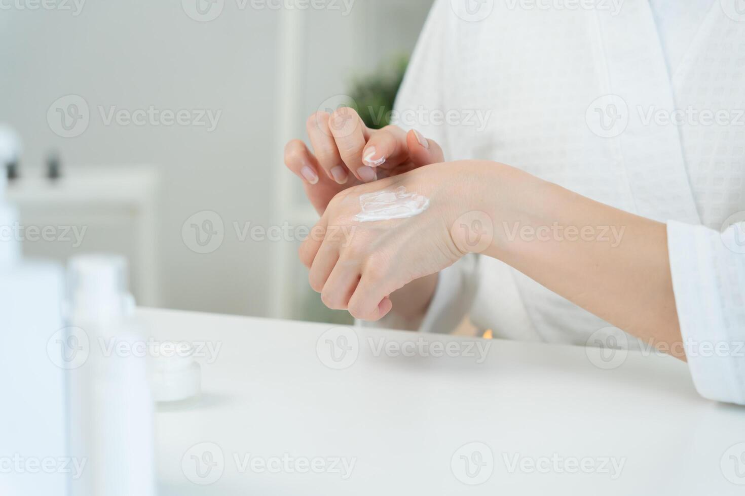 Beautiful Asian woman smile use cream for good skin. healthy woman apply cream for body. Advertisement for skin cream, anti-wrinkle, baby face, whitening, moisturizer, tighten pores photo