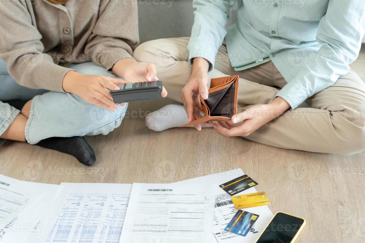 Stress and headache asian couple with large bills or invoices no money to pay to expenses and business problem. shortage, Financial problems, mortgage, loan, bankruptcy, bankrupt, poor photo