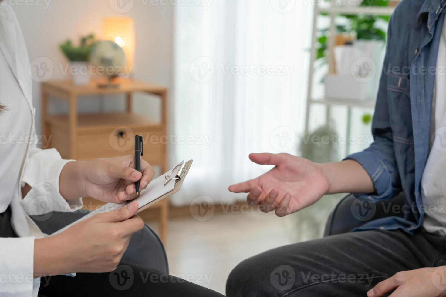 male with mental health problem is consulting. psychiatrist is recording the patient's condition for treatment. encouragement, love and family problem, bipolar , depression patient, protect suicide photo