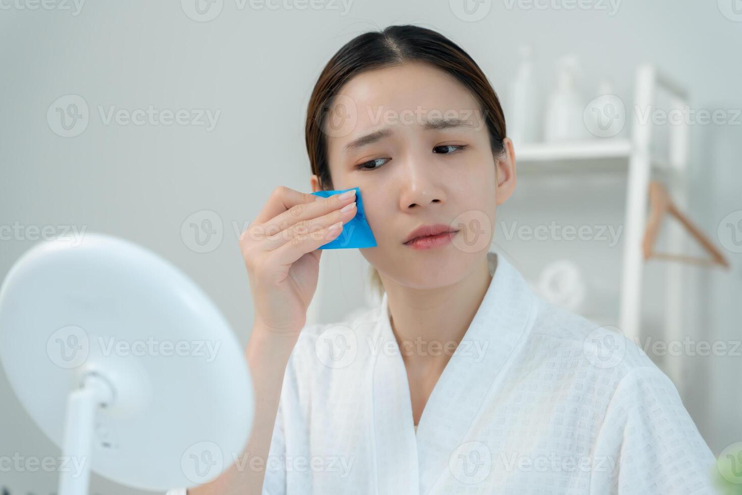 Oily face problem, Woman worried about face Dermatology, large pores, uneven face, sensitive skin, red face from sunburn, acne, dry skin, large pores ,rash face, dull, freckles, wrinkle, skin problem photo