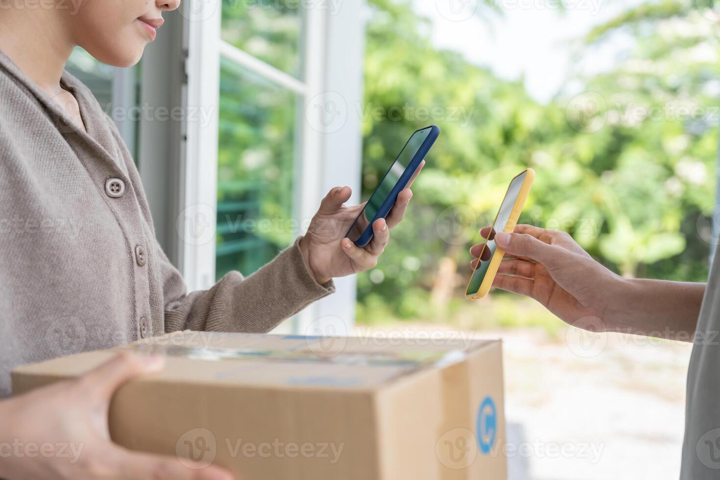 Happy smile Asian woman scan QR code for pay of food. Delivery man send deliver express. online shop, paper container, takeaway, postman, delivery service, packages, Digital transfer photo
