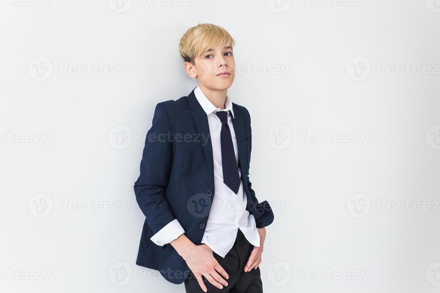 Teenage depression and puberty concept - Sad teenager portrait close up on white background with copy space. photo