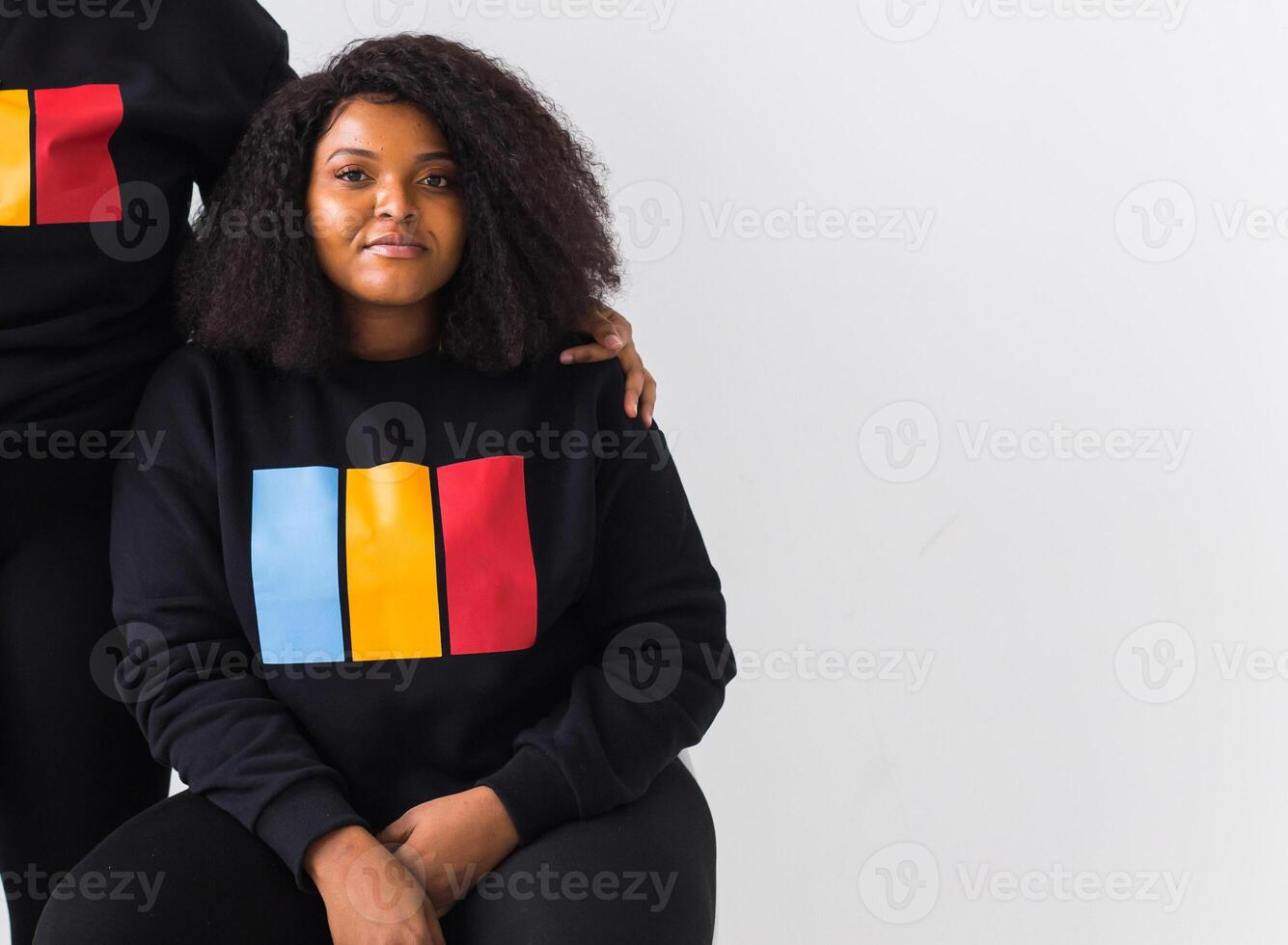 Happy African American woman on white background with copy space. photo