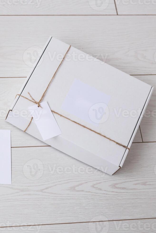 Box with space for advertisement delivered from online store. Internet shopping and delivery concept. Mockup photo