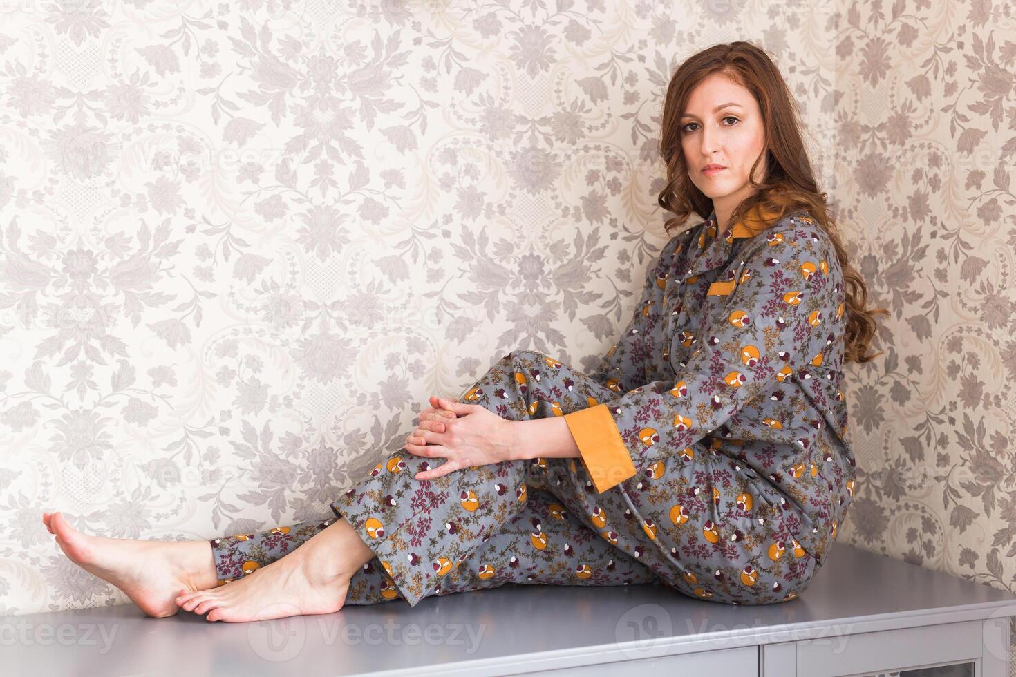 Female wears pajama at home photo