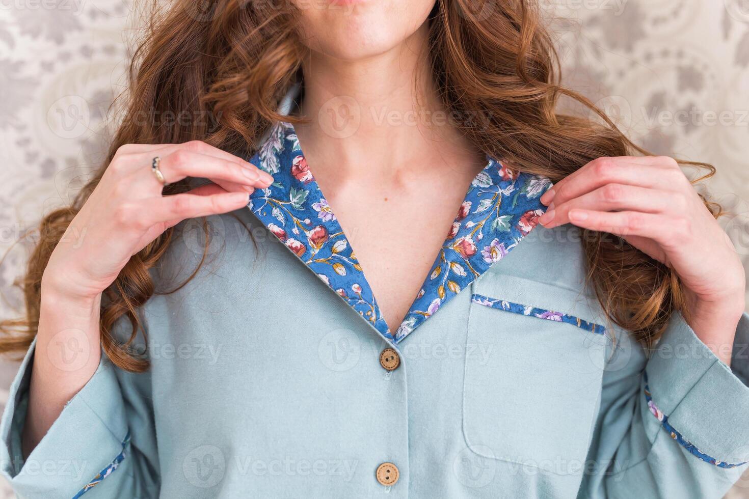 Warm kit homewear closeup. Soft cotton shirt. Comfortable clothes for healthy sleep. Pajamas concept. Close-up. photo