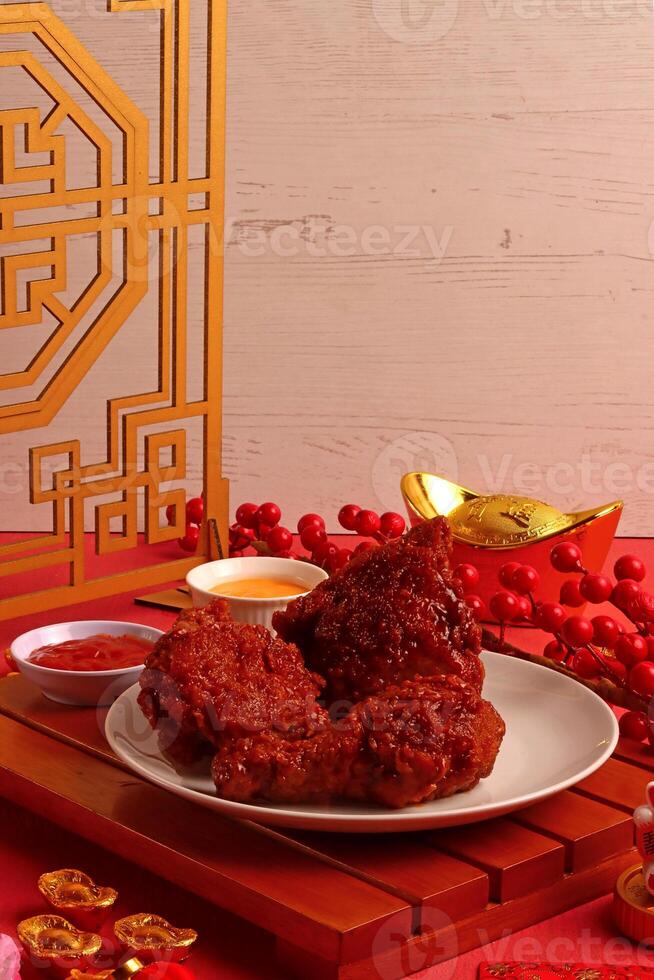 a plate of food on a table with a chinese symbol on it photo