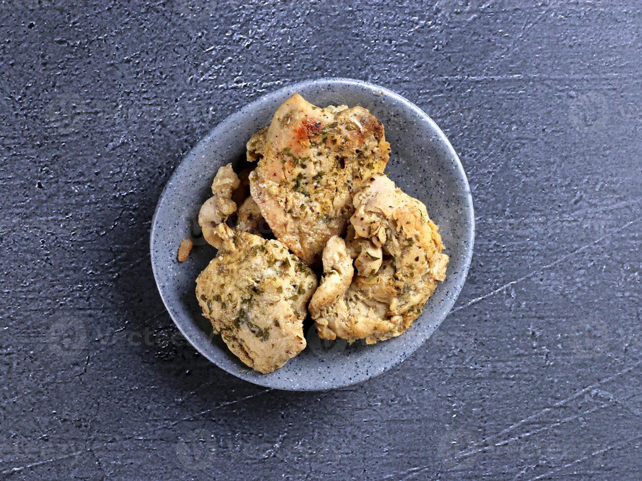 a plate with some chicken on it photo