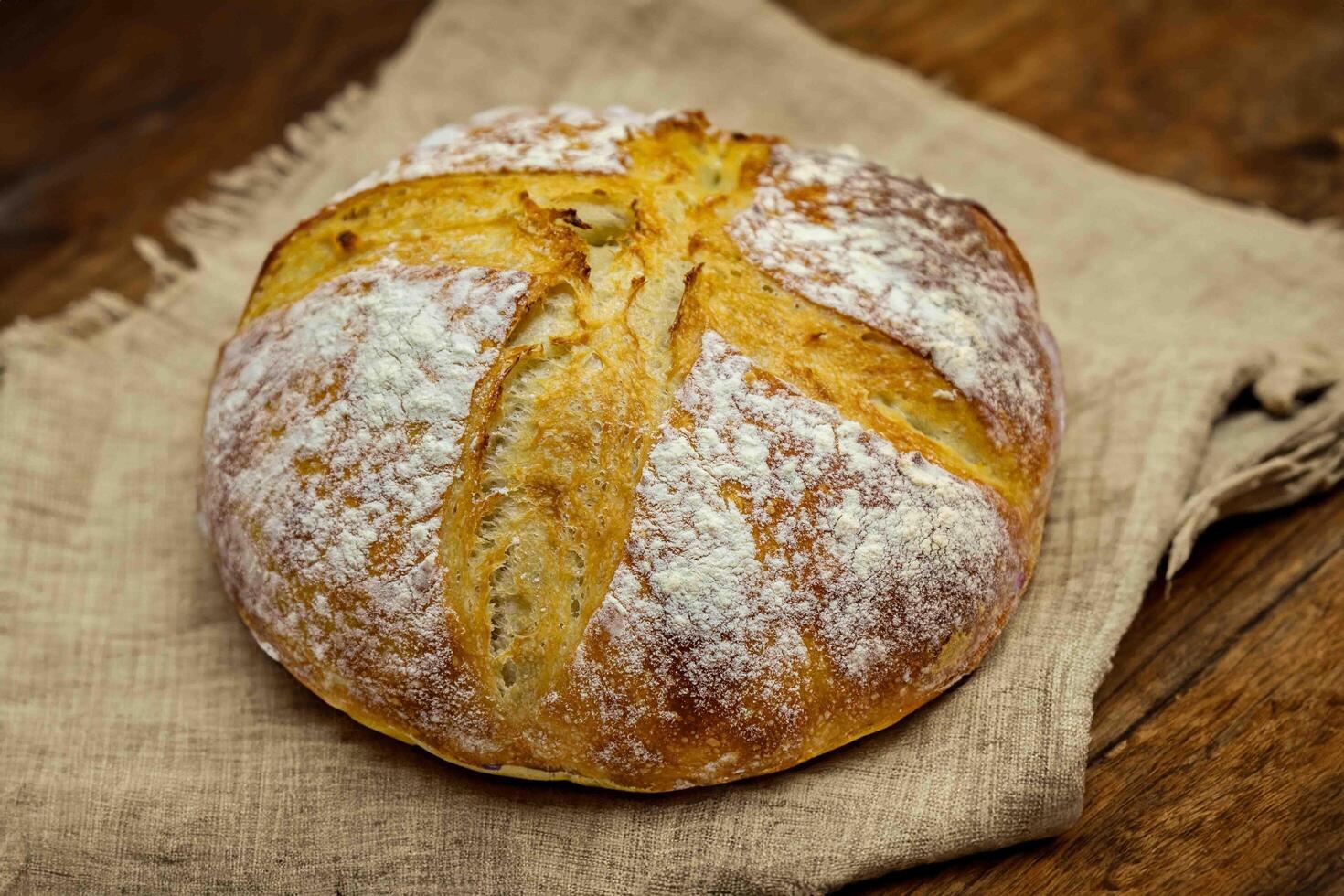 Rustic sourdough bread with natural fermentation, real food, ancestral, vintage and homemade artisan food only the best photo