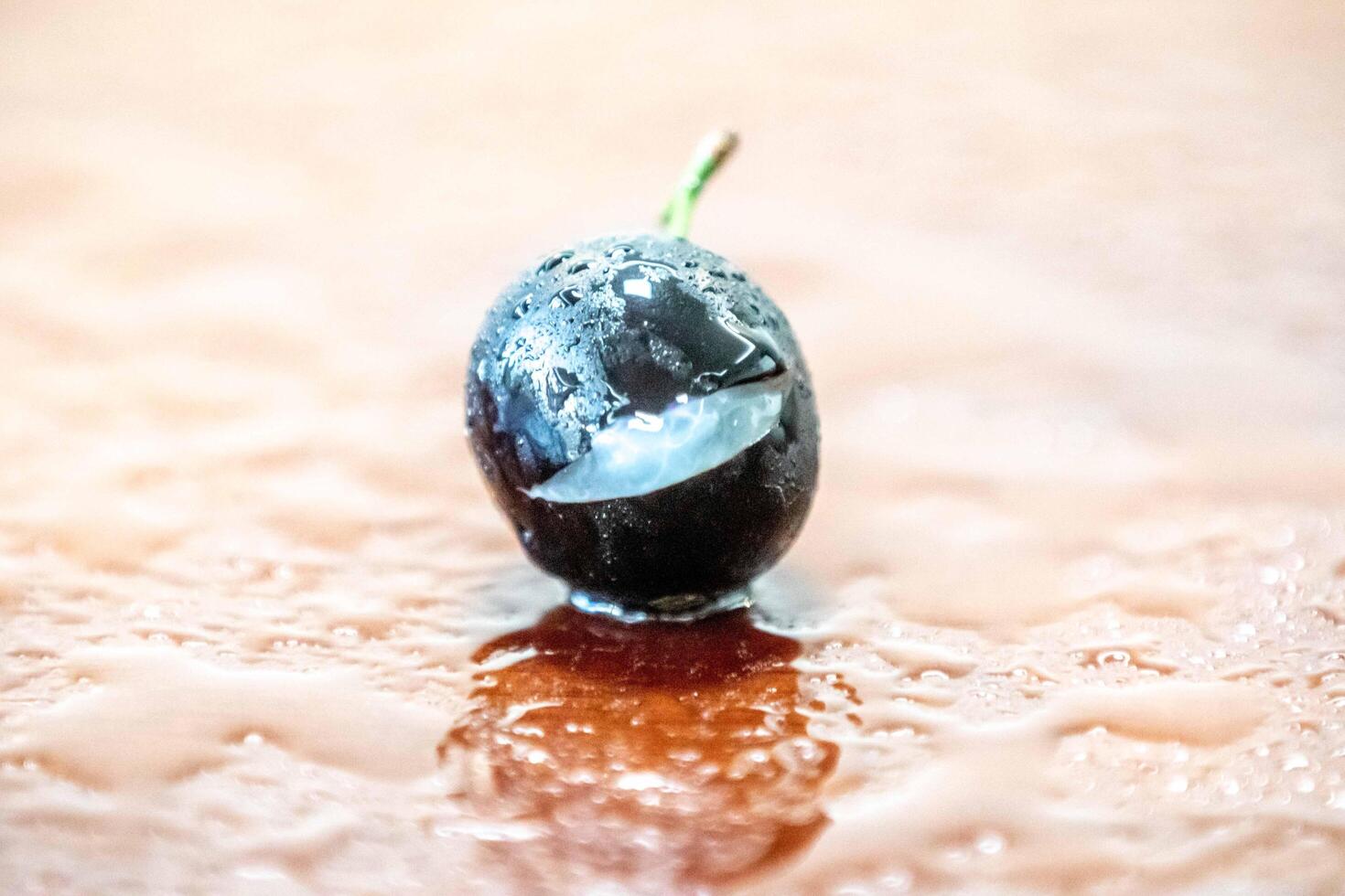 Beautiful and juicy ripe jabuticaba fruits in fine detail open photo