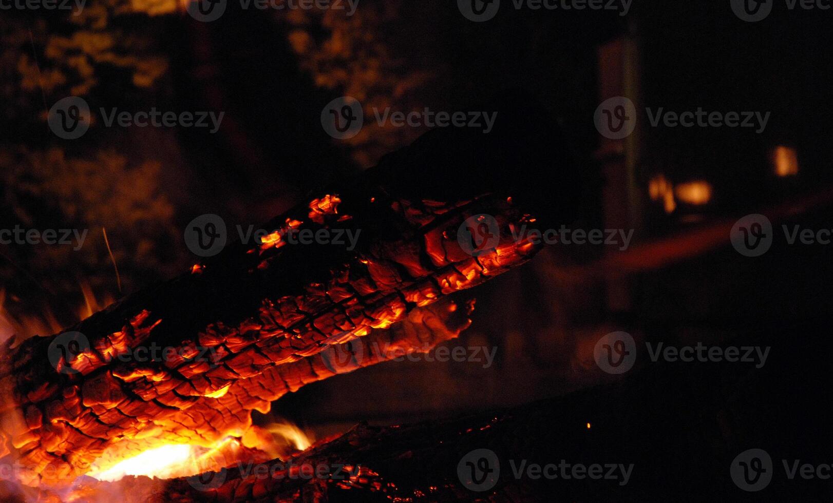 Glowing Log in Campfire at Night photo