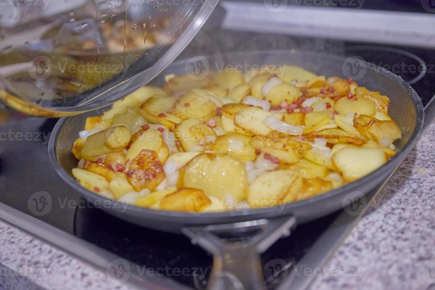 Sizzling Fried Potatoes with Onions and Bacon photo