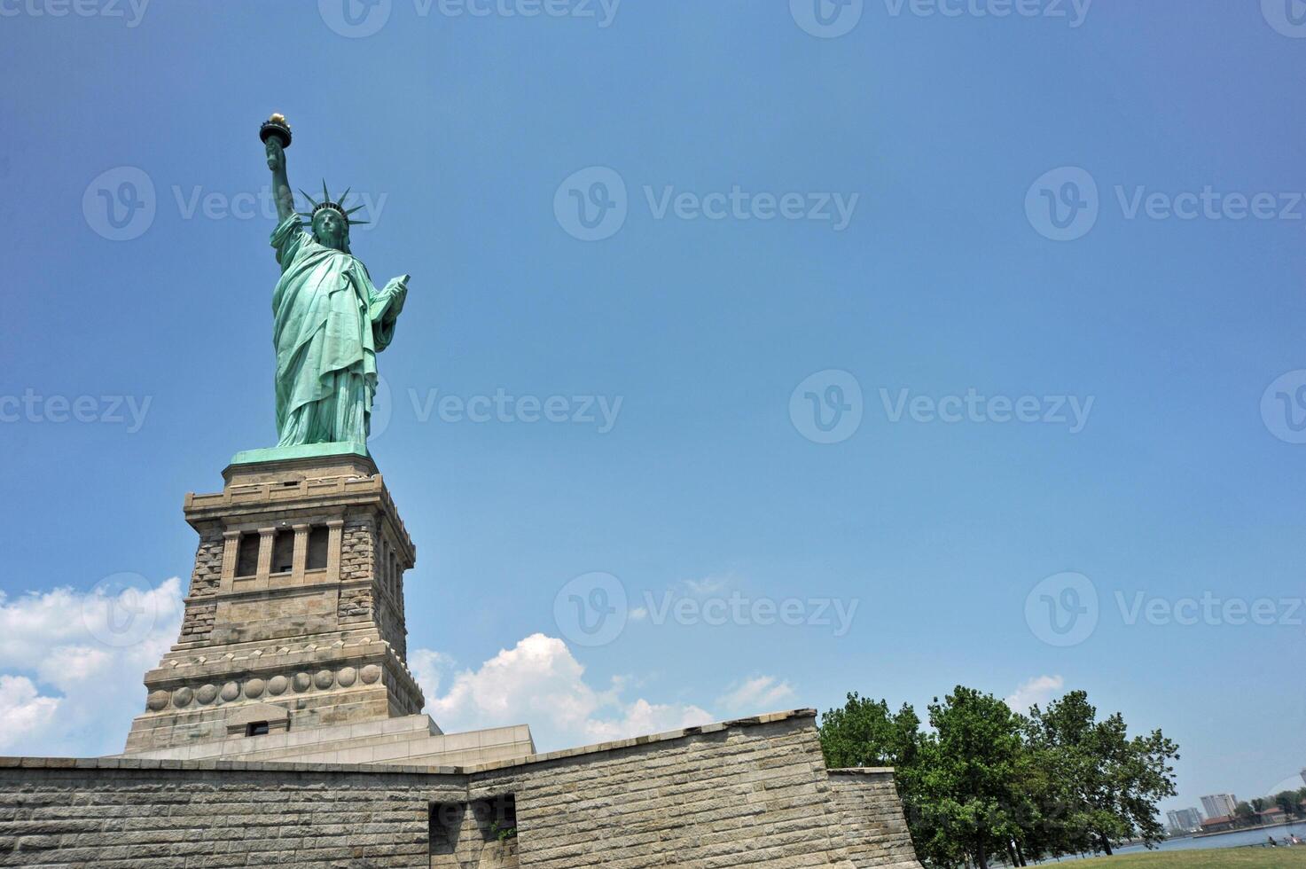 Statue of Liberty Against Clear Blue Sky photo