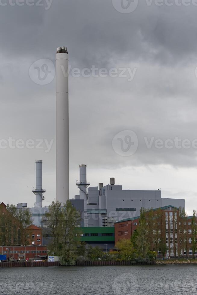 Industrial Power Plant Under Overcast Sky at Flensburg Harbor photo