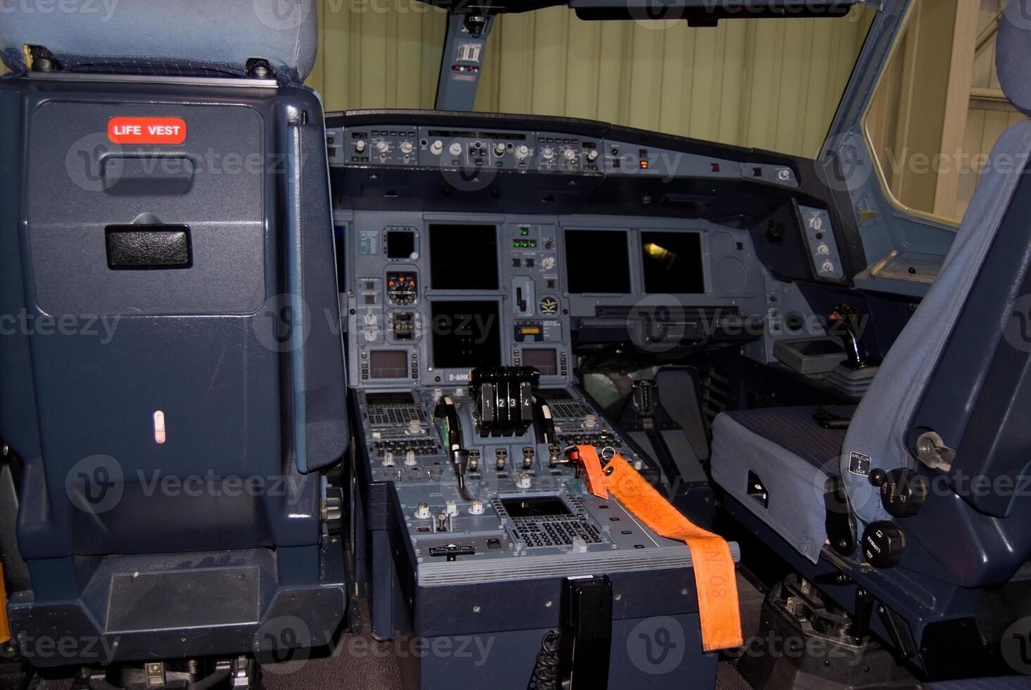 Aircraft Cockpit Interior with Controls and Instruments photo