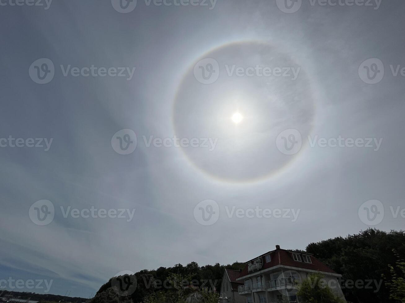 Moon Halo in Cloudy Sky photo