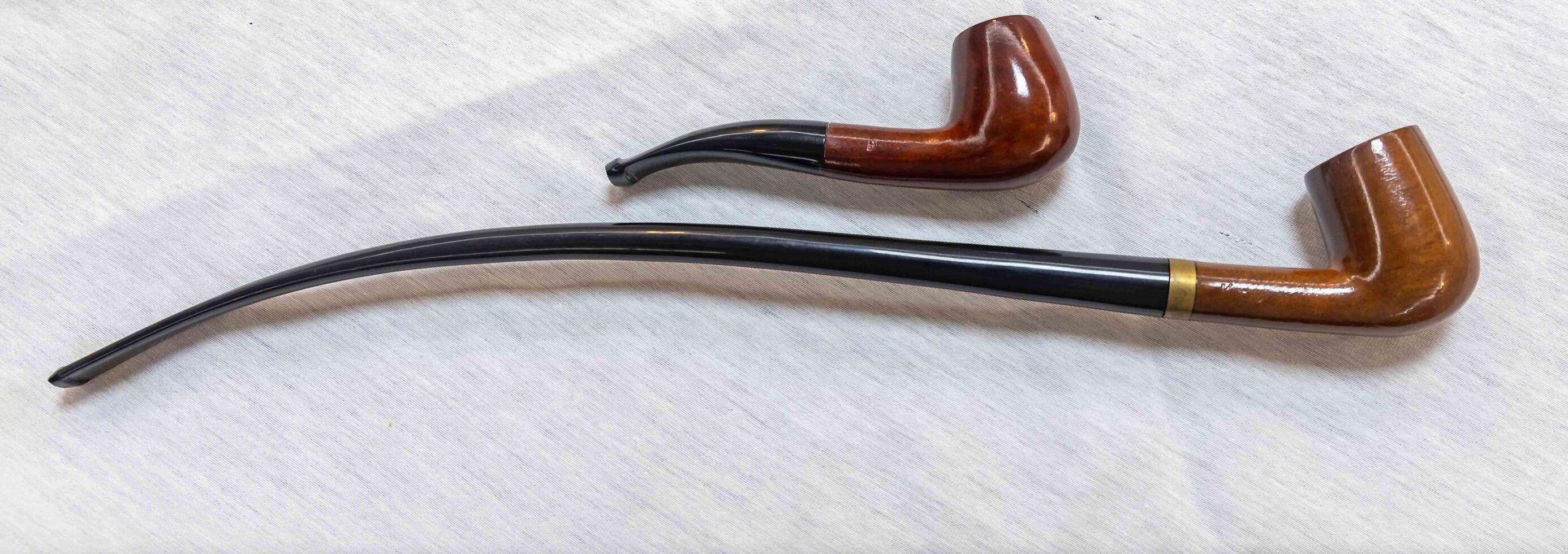 Hand holding luxurious pipe in selective focus and smooth background 2 photo