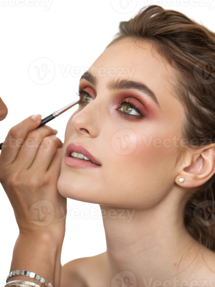 A young Caucasian woman receiving makeup application with soft, glamorous colors enhancing her natural beauty. png