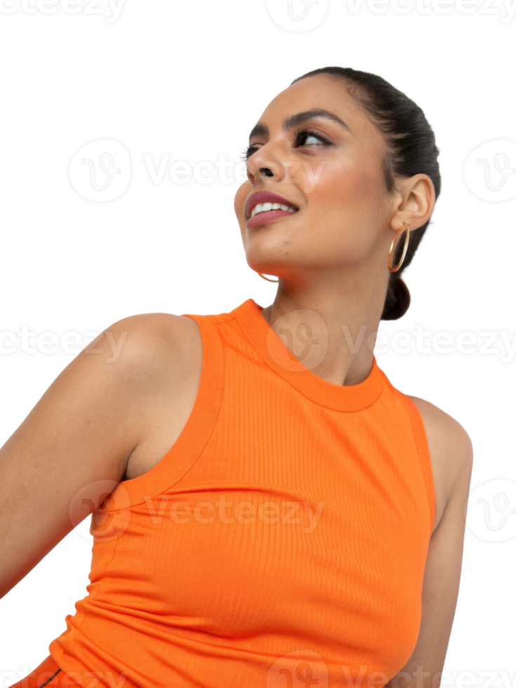 Confident young South Asian woman in an orange sleeveless top, looking off to the side with a stylish expression. png