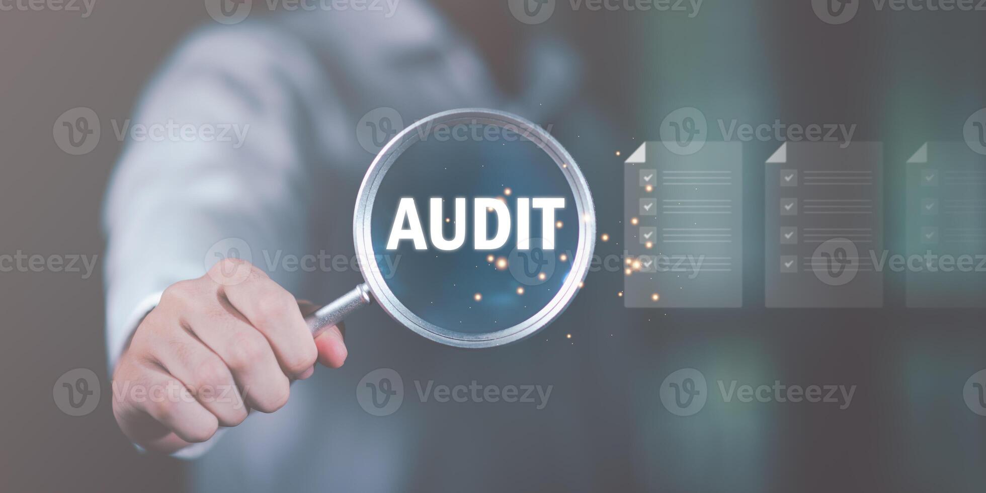 business document evaluation process, market data report analysis and consulting,Businessman holding a magnifying glass, showing Audit Document concept,quality assessment management With a checklist photo