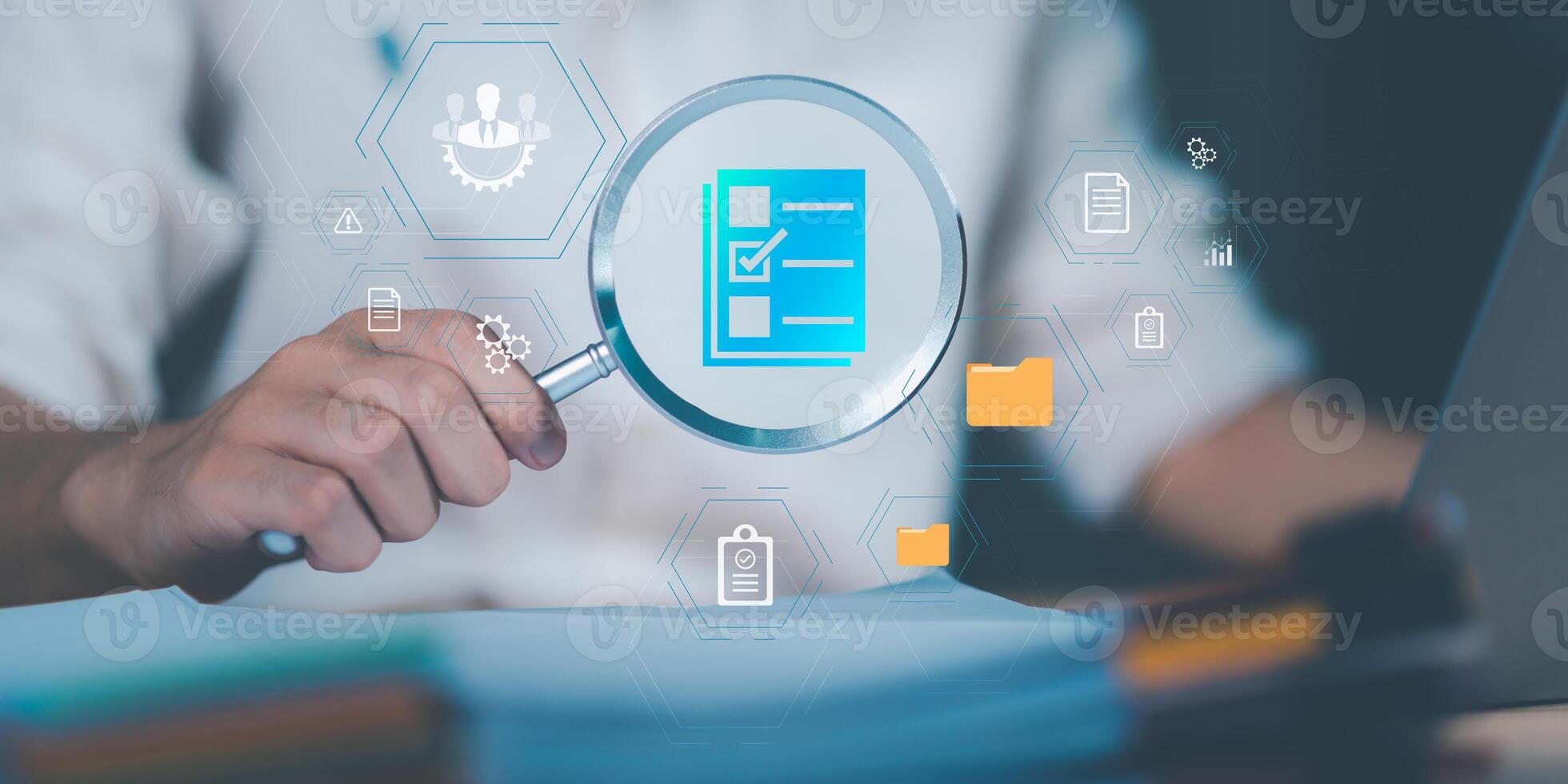 Management of important document storage of organization ,ERP document system ,quality assessment management With a checklist ,online document database ,Auditor worker working with document folder photo