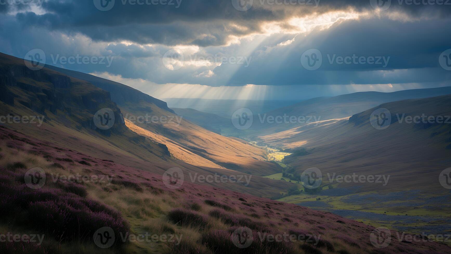 Sun Rays Over Valley Creating Dramatic Light and Shadow on Landscape photo