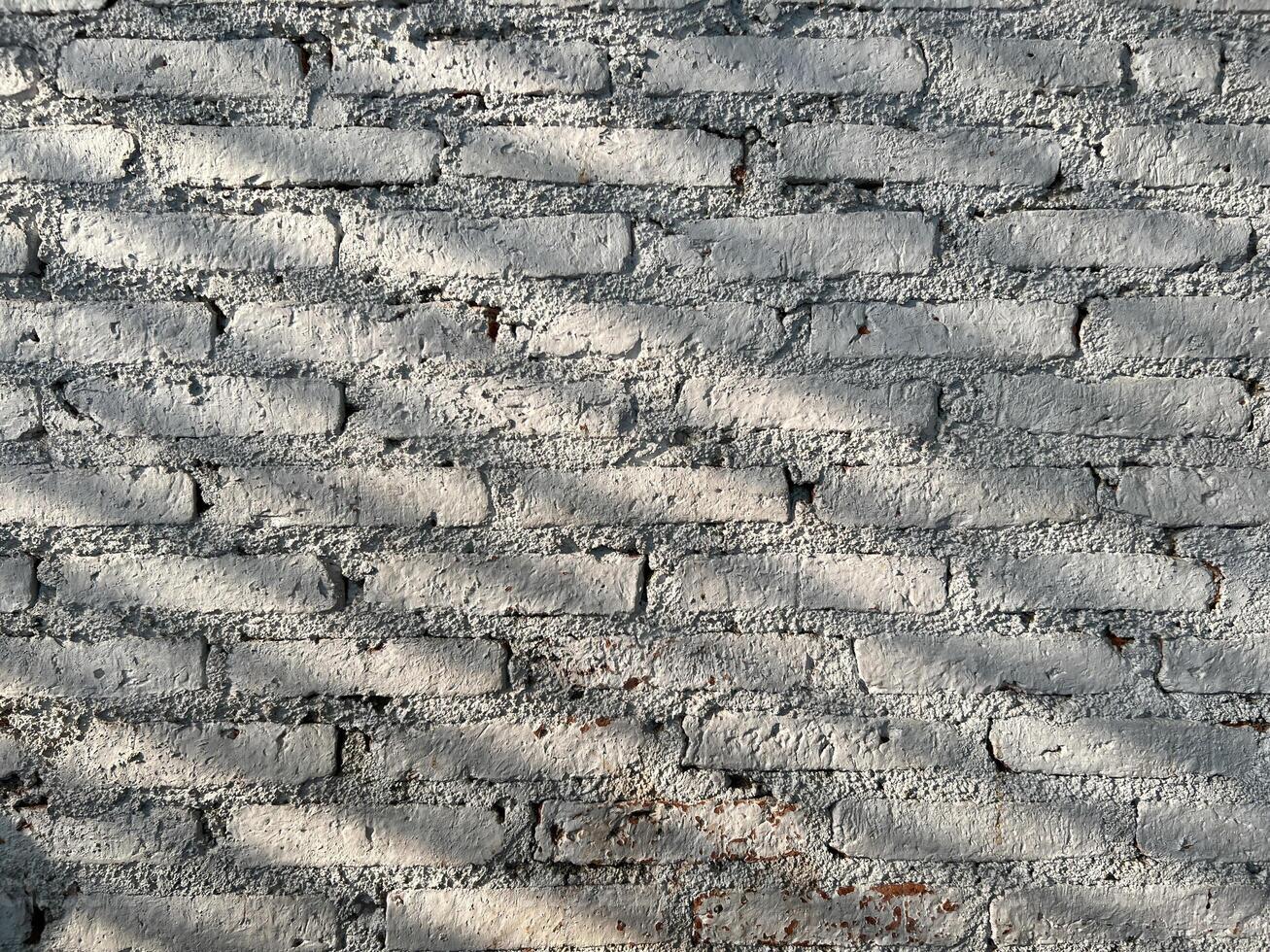 Cement Brick Wall with Pattern of Shadow lines on Wall. Background Cocnept photo