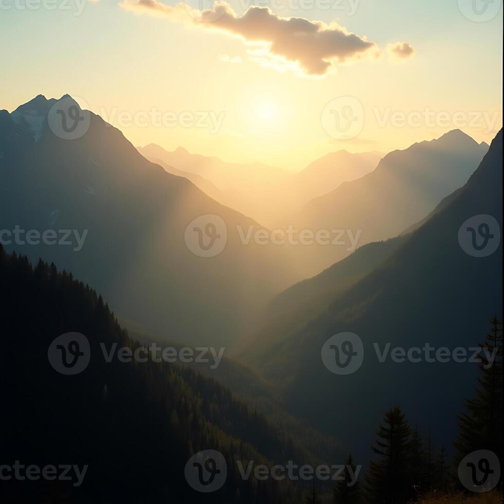Mountain Valley at Sunset with Golden Light Shining Through the Peaks photo