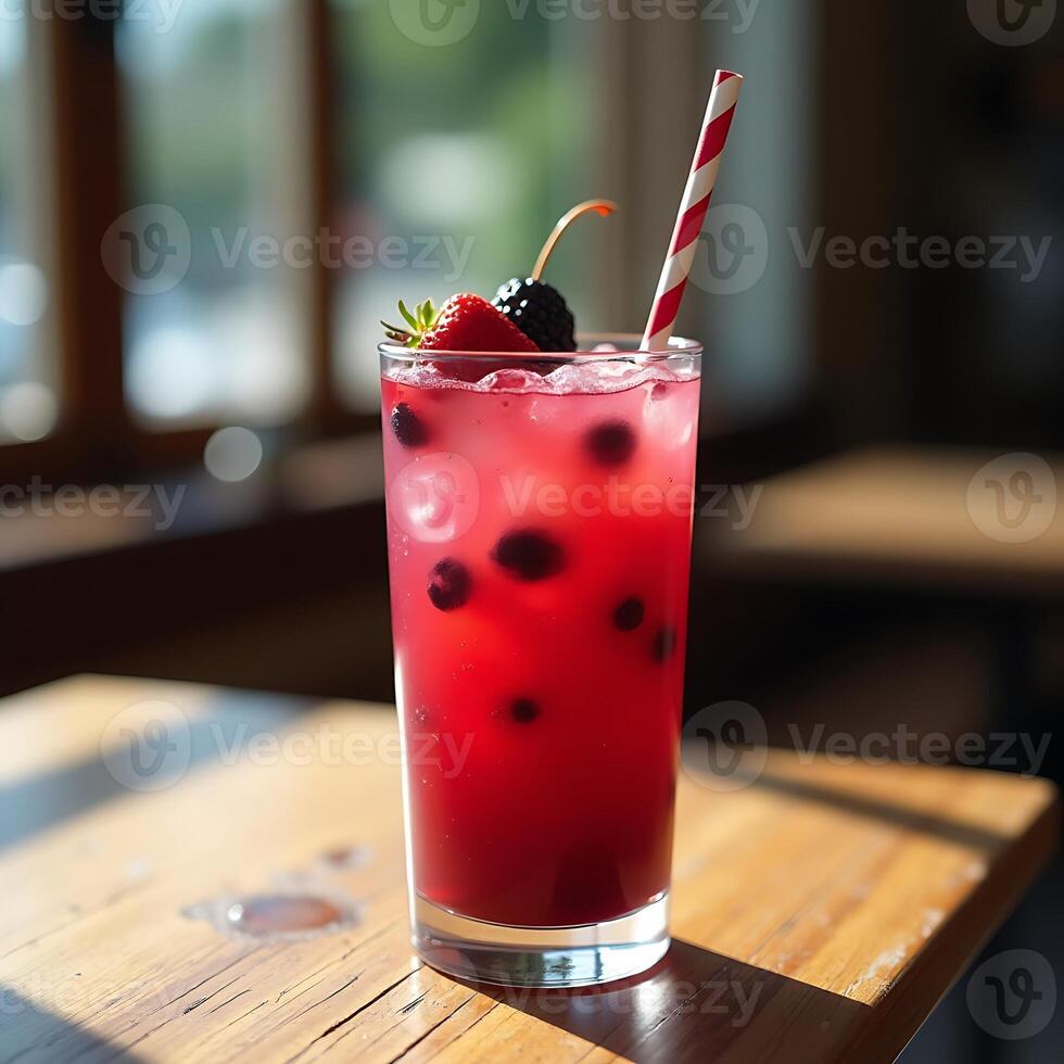 Refreshing Berry Drink with Ice and Straw on Wooden Table photo