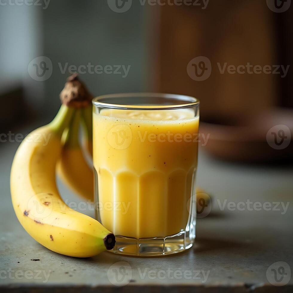 Banana Smoothie in Glass with Fresh Fruit for Healthy Drink photo