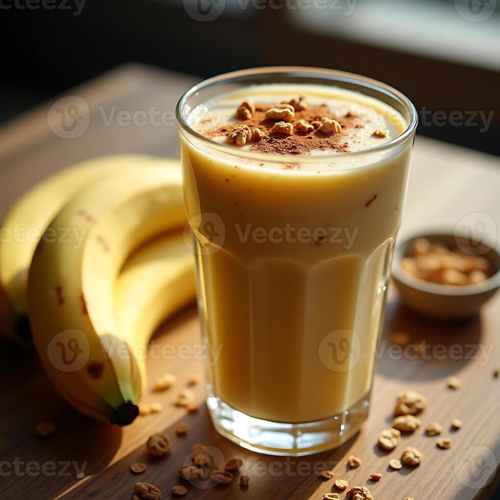 Banana Smoothie with Toppings Served in Glass on Table photo