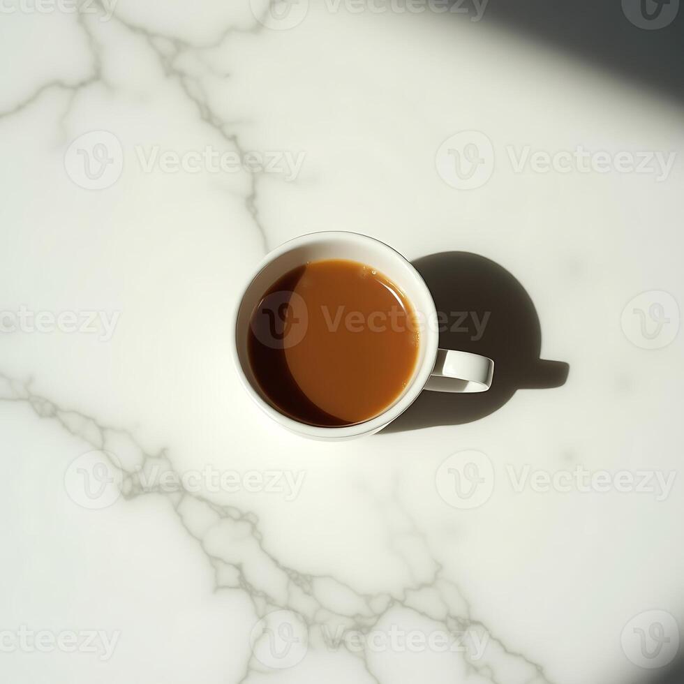 Coffee Cup on Marble Table with Sunlight and Shadow photo