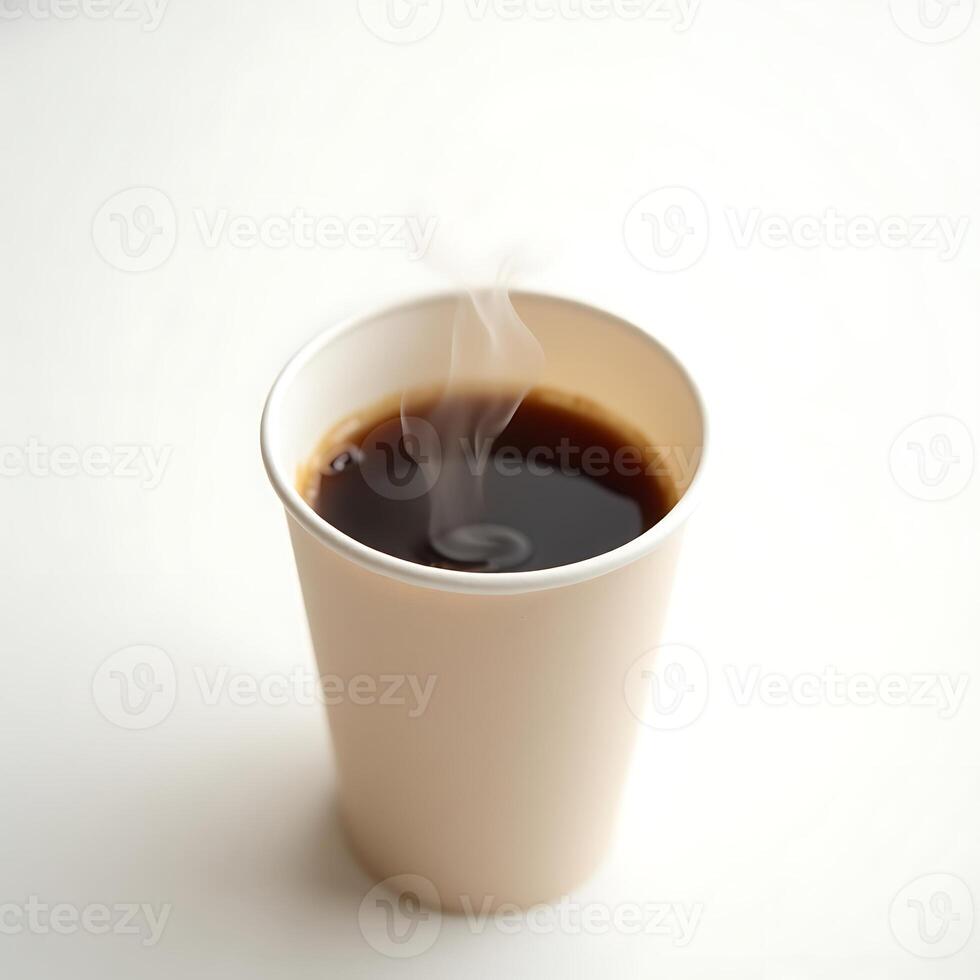 Hot Coffee in Paper Cup with Rising Steam on White Surface photo