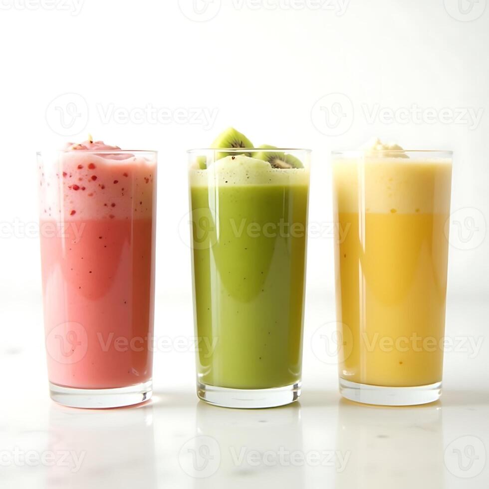 Colorful Fruit Smoothies in Glasses on White Surface photo