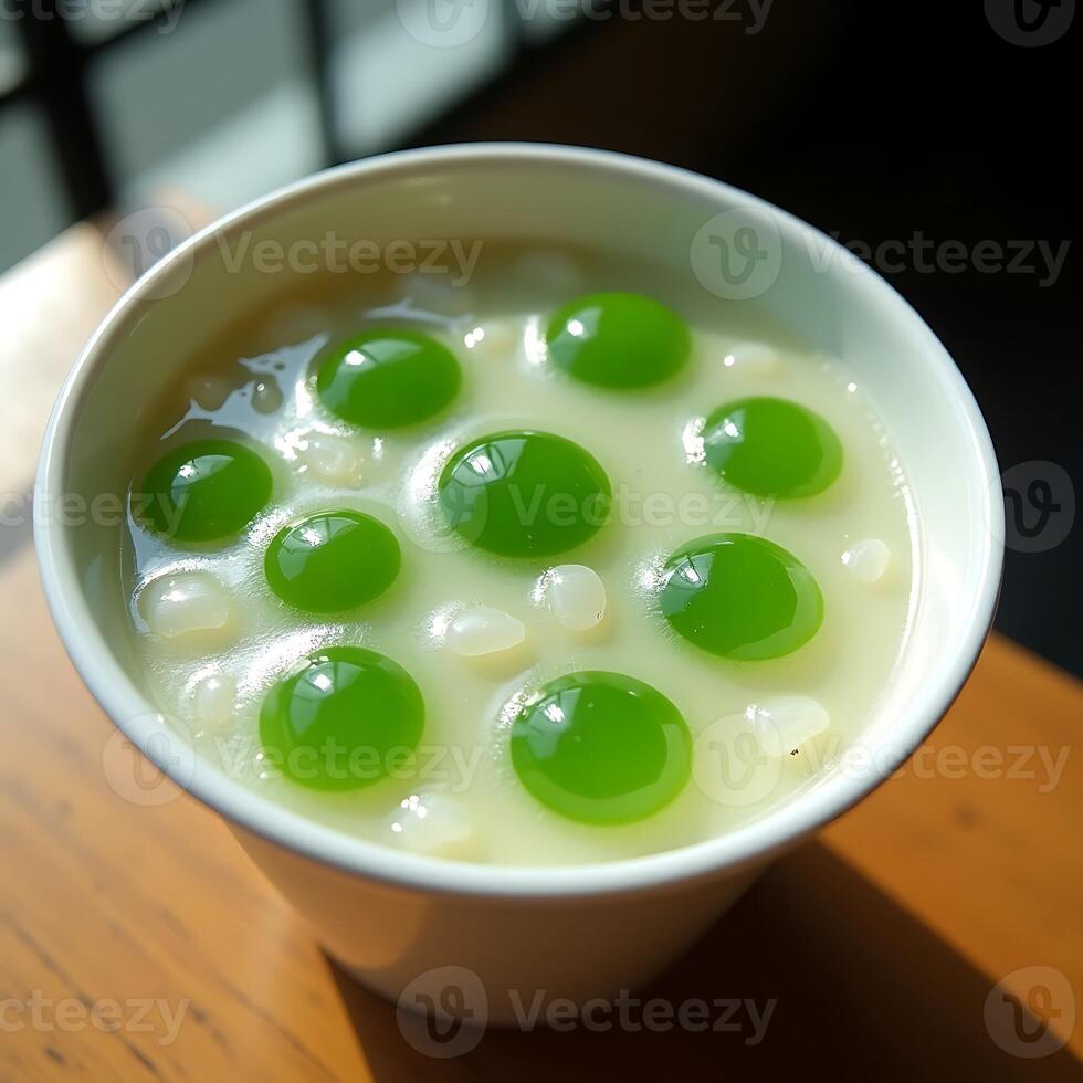 Serving of Green Tapioca Dessert in Bowl photo
