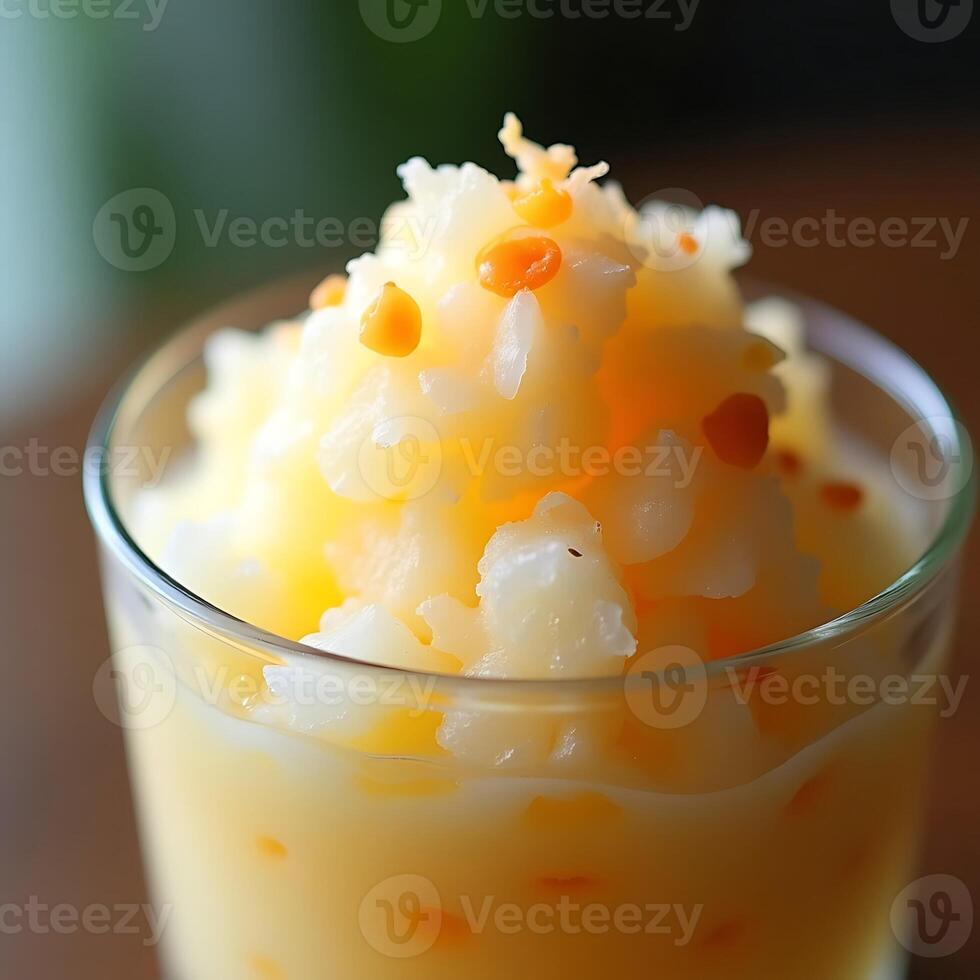 Serving Refreshing Fruit Slush with Small Orange Garnish in a Glass photo