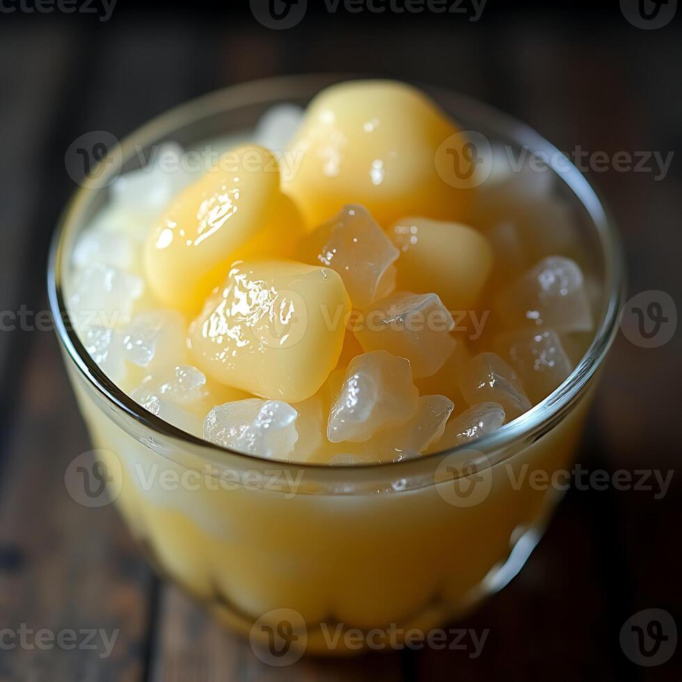 Serving Sweet Dessert with Tapioca and Fruit in Glass Cup photo