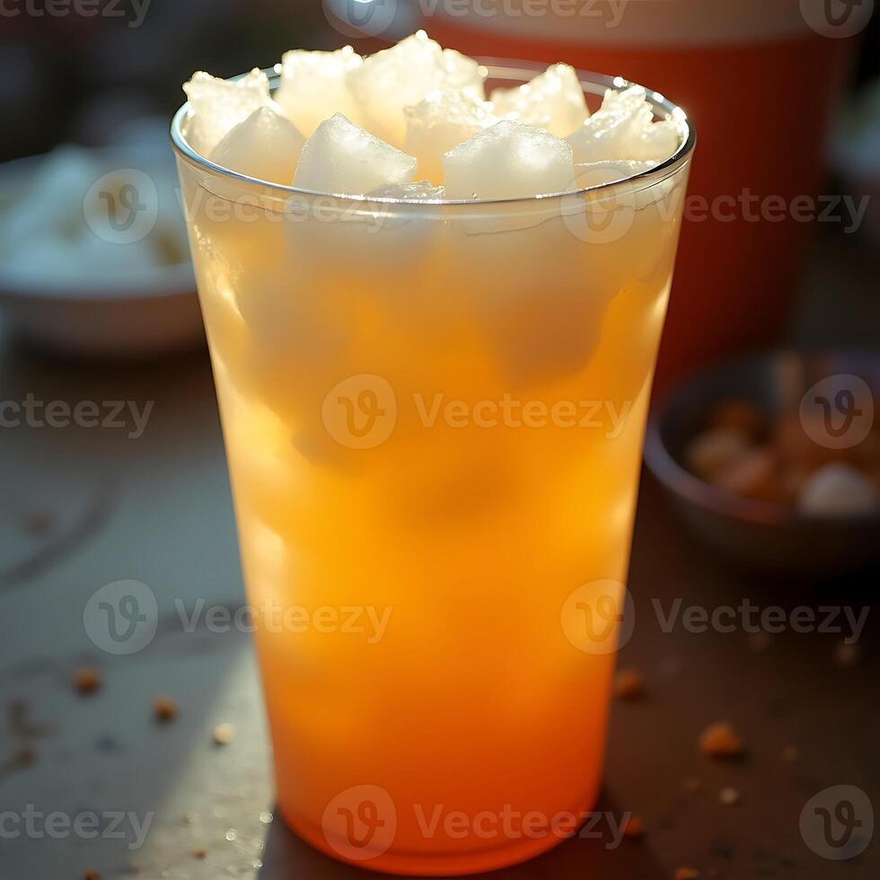 Refreshing Cold Drink with Ice in Tall Glass photo