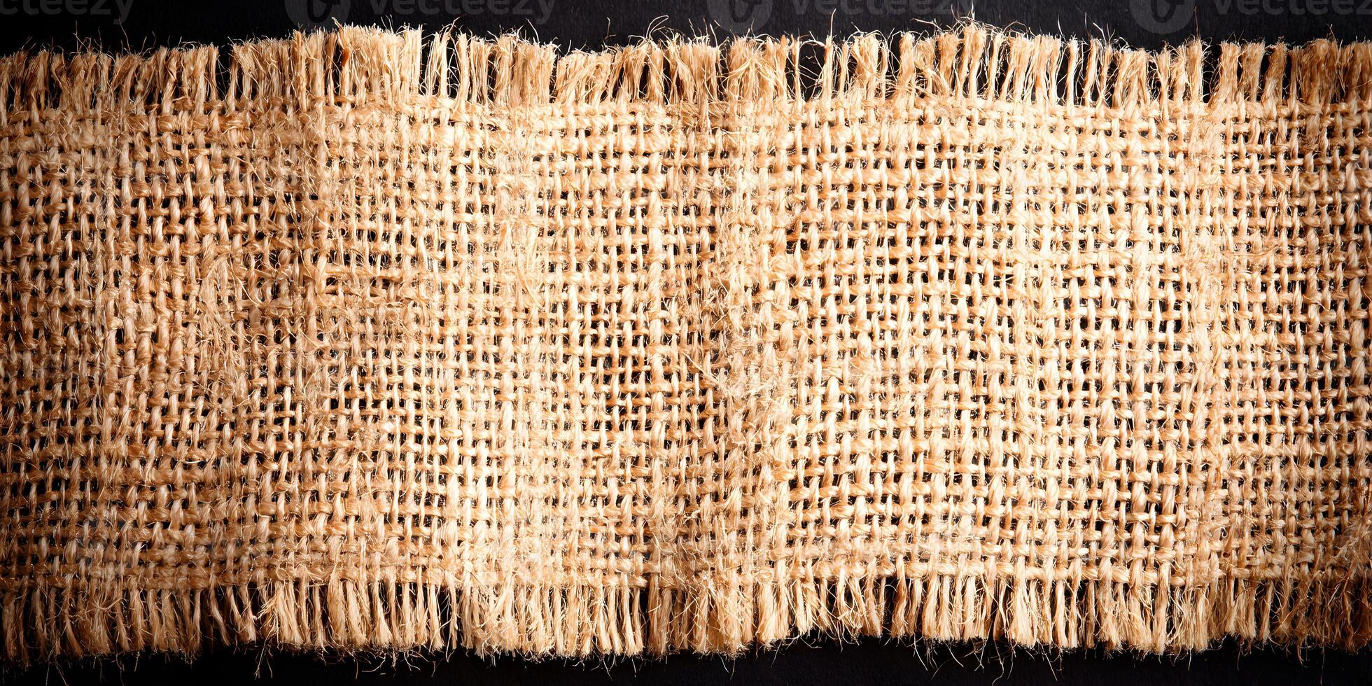 Brown Burlap Fabric Texture Close Up with Frayed Edges photo