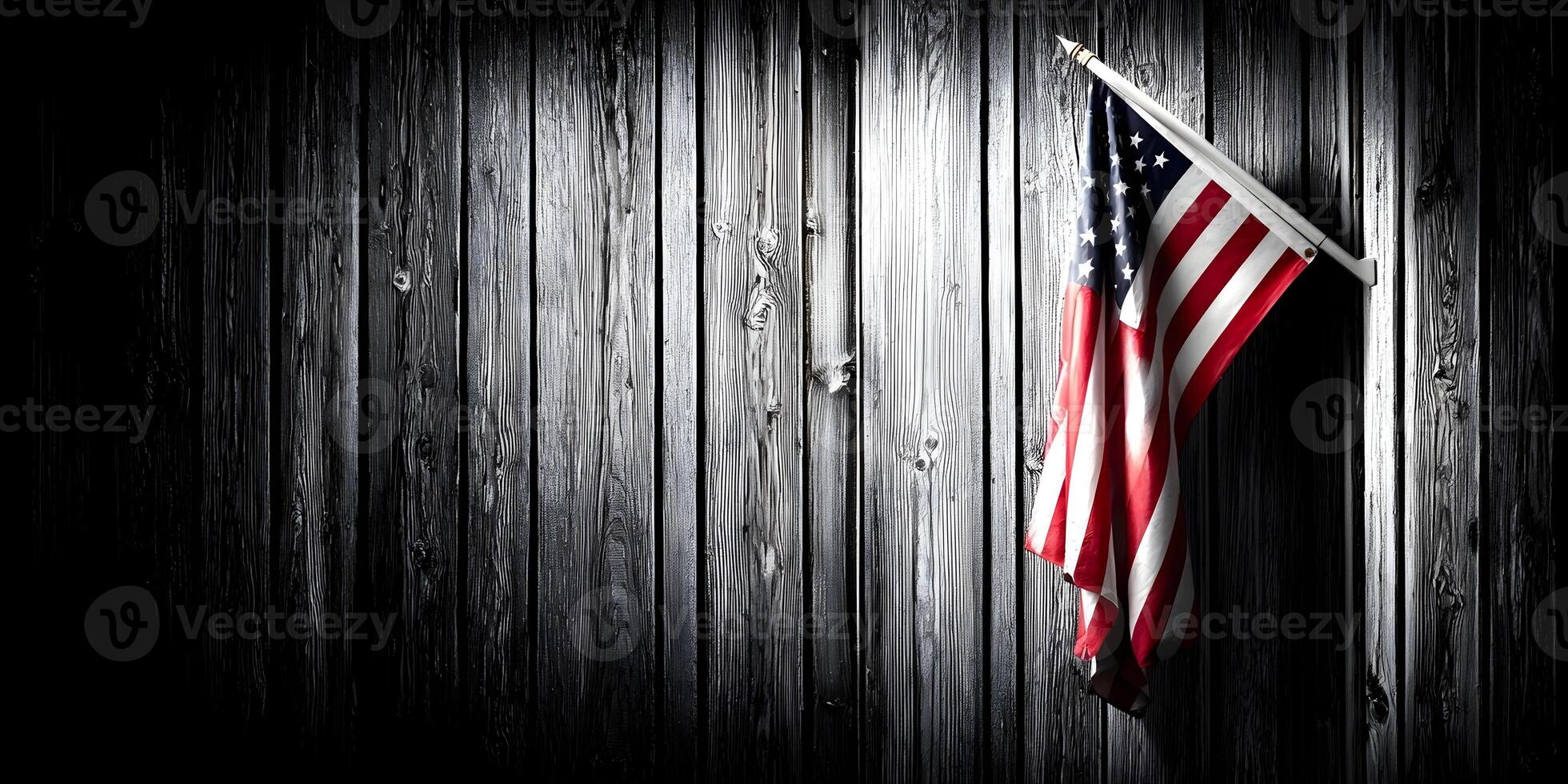 American Flag Hanging on Dark Wood Fence Background photo