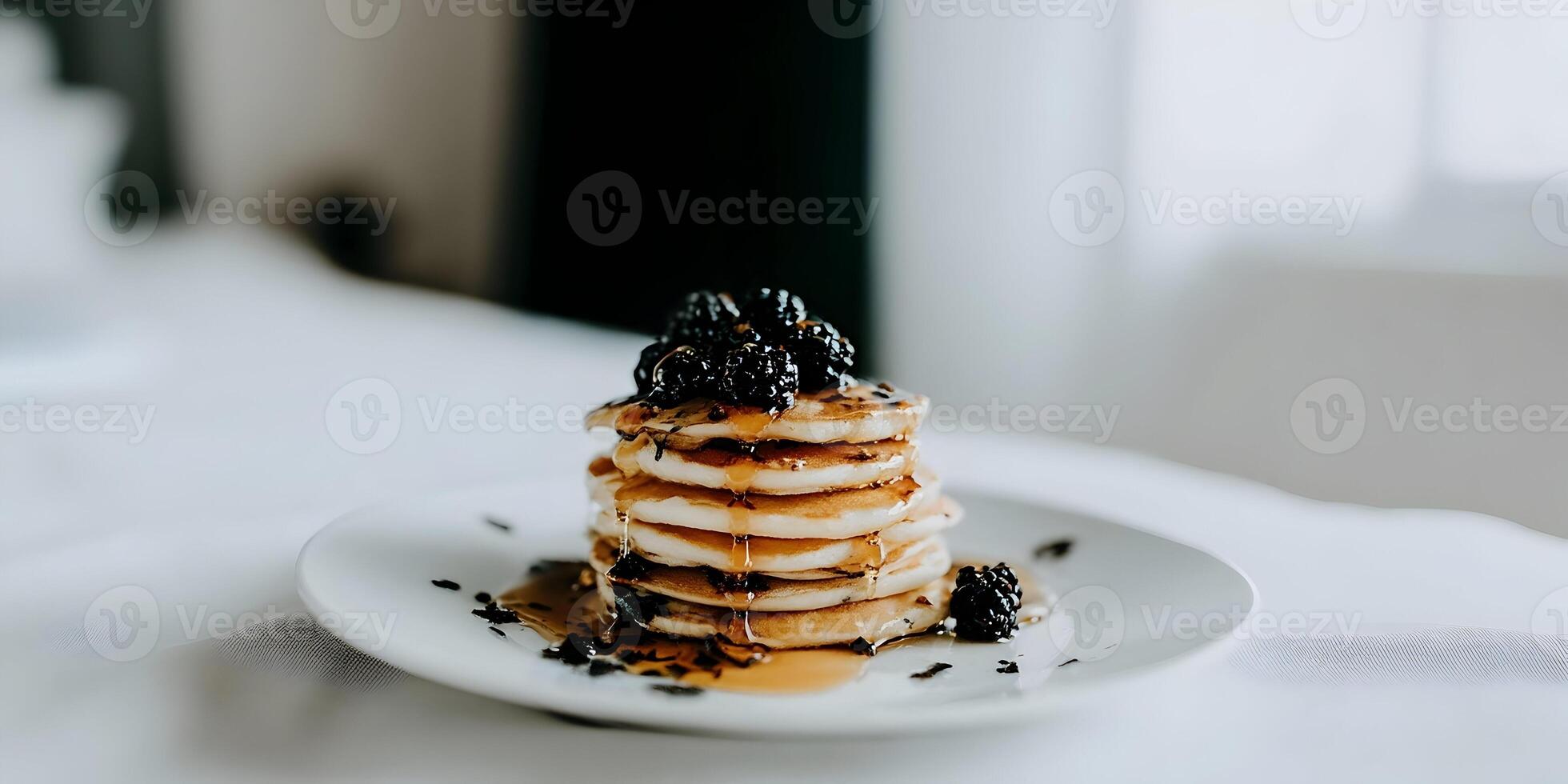 Delicious Pancakes Stack with Blackberry Topping and Syrup Drizzle photo
