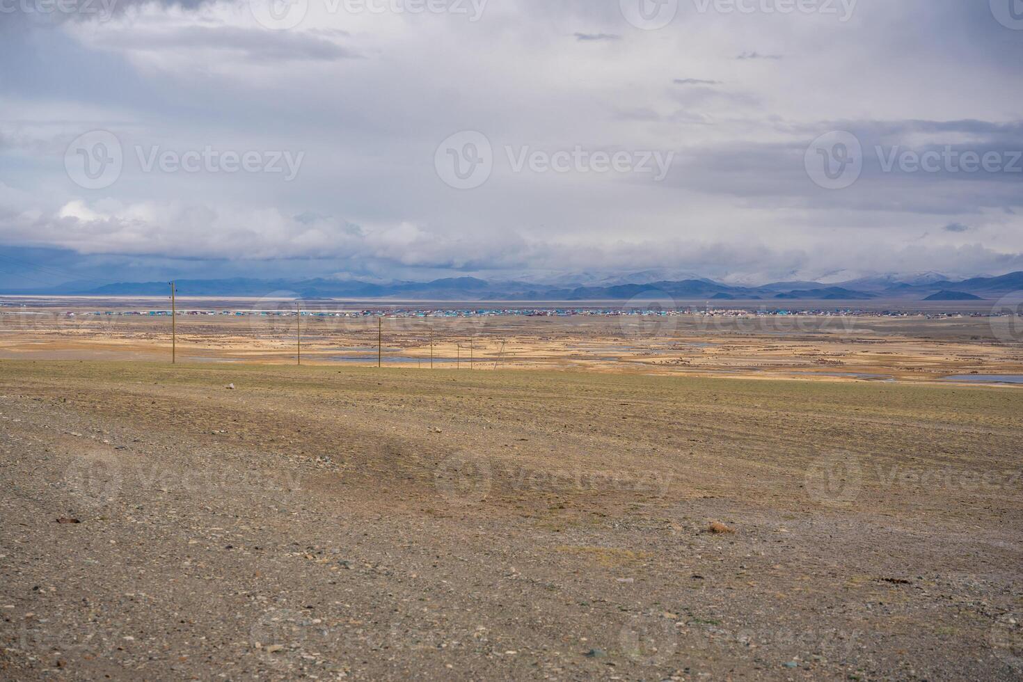 Flat valley near Kosh-Agach Altai Russia with expansive open landscape. Wide plain showcasing natural terrain and mountain surroundings. High quality photo