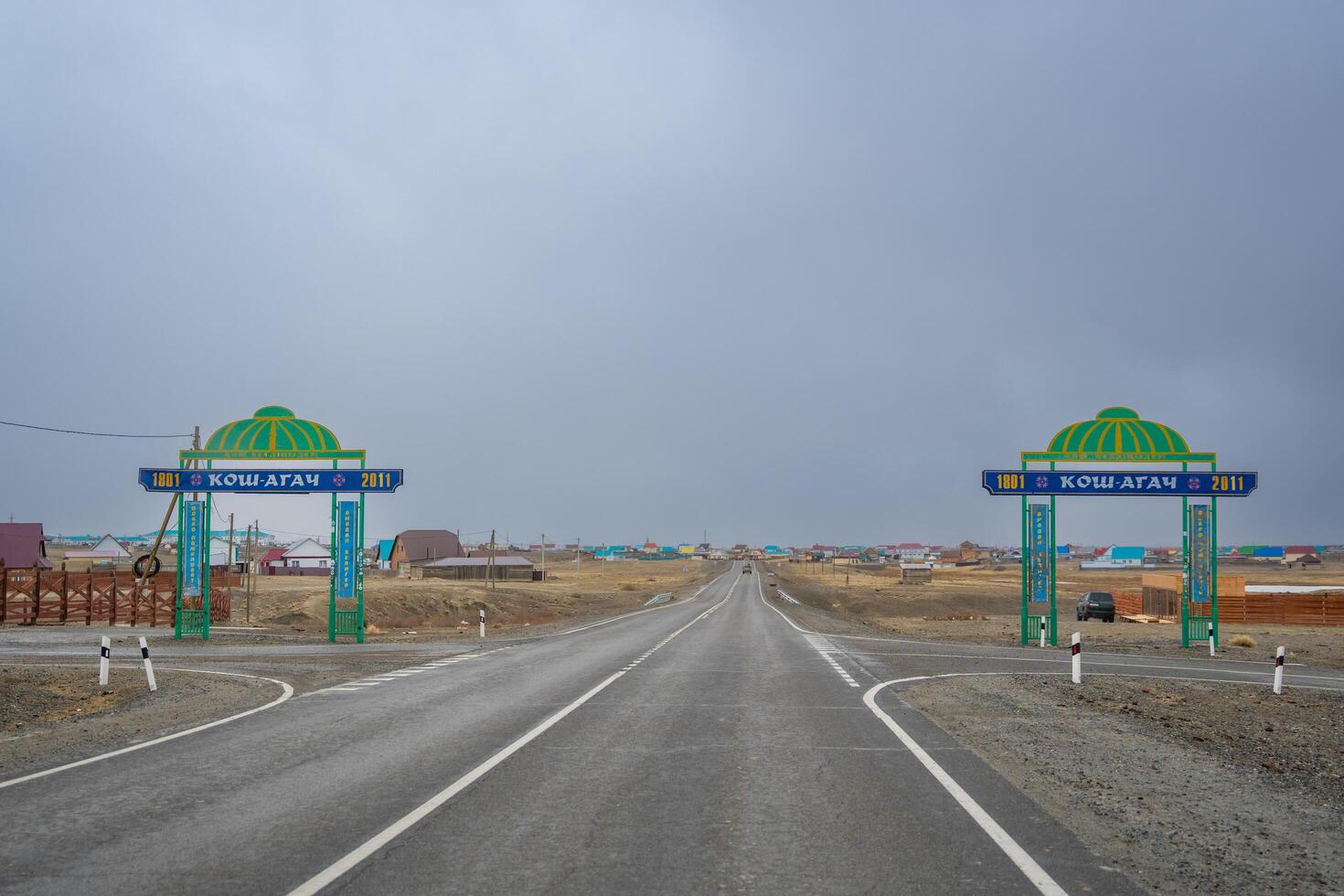 Kosh-Agach, Russia - May 8, 2025. Entrance to the town of Kosh-Agach Altai Russia. Gateway to a remote Siberian mountain settlement on the border with Mongolia. photo