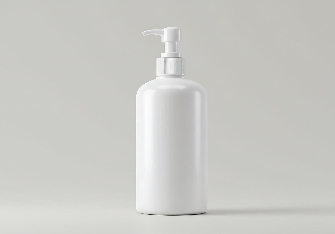 White plastic bottle with soap on a gray background photo