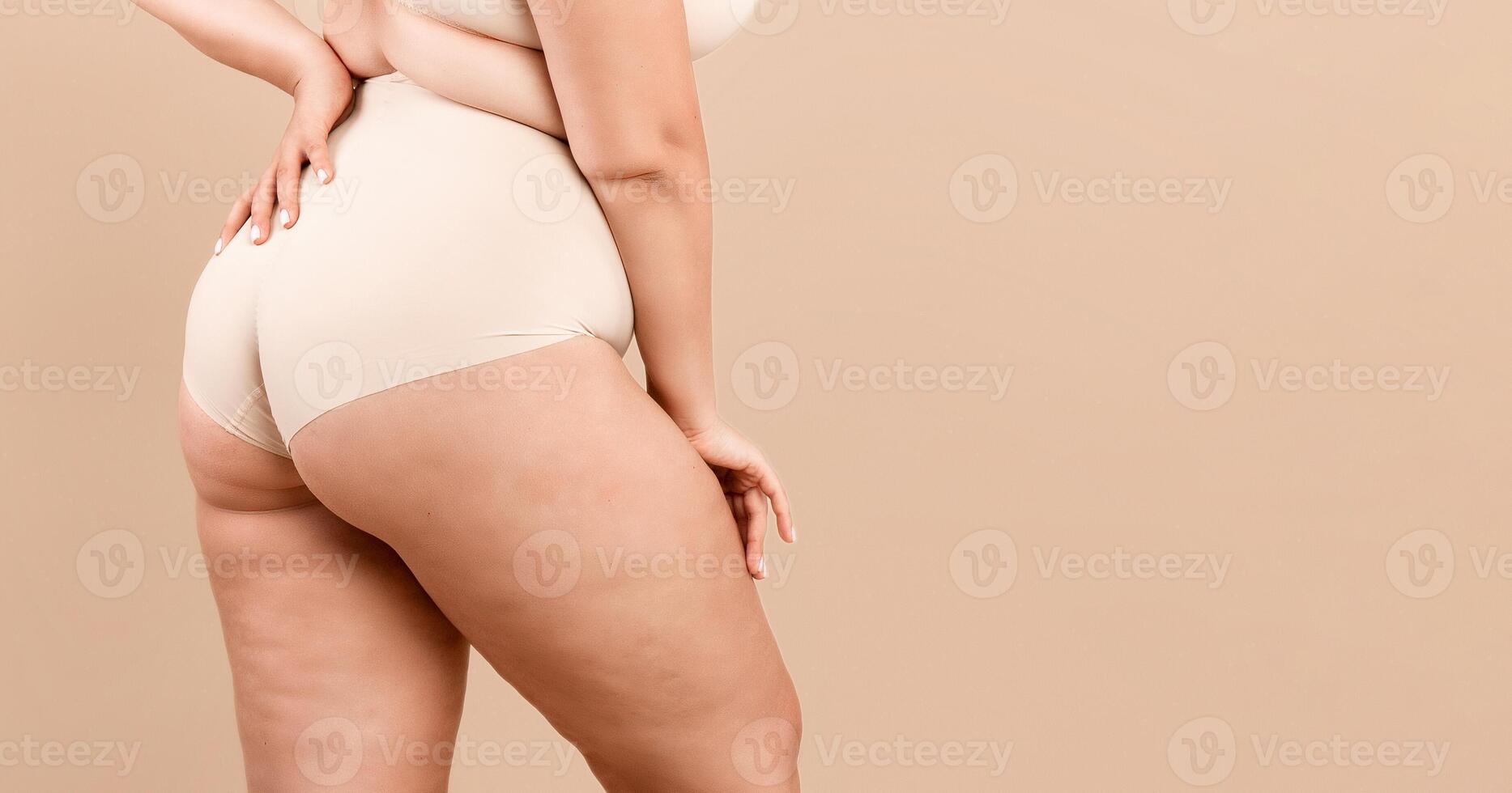 Plus Size Lady. Cropped Shot Of Unrecognizable Curvy Woman Posing In Underwear, Oversized Female Standing In Lingerie Over Beige Studio Background, Enjoying Her Natural Beauty, Panorama, Free Space photo