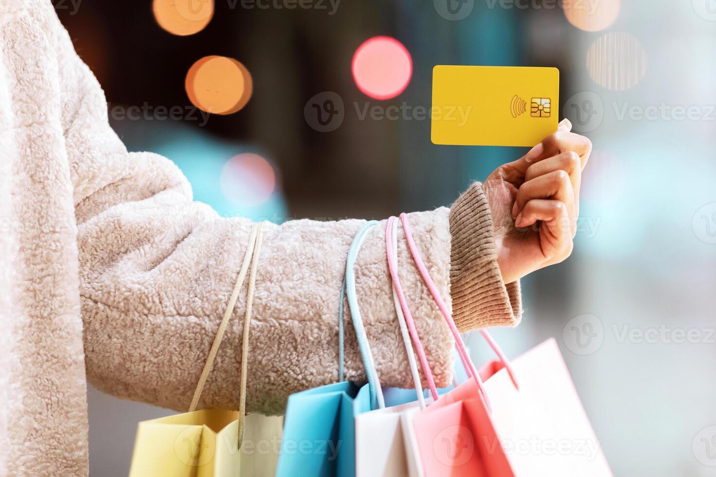 Cashback, Retail And Purchase, Contactless Payment. Closeup Of Unrecognizable African American Woman Holding Credit Card In Hand, Standing With Colorful Shopping Bags Outside Near Mall photo