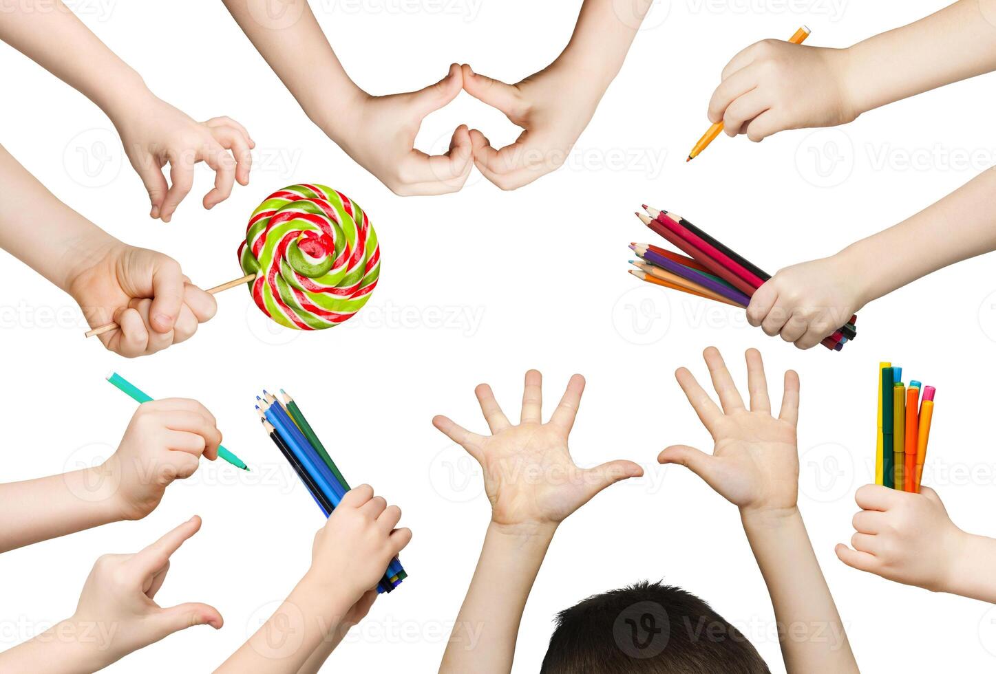 Set of child hands holding items. Lollipop, pencils and showing heart, symbols in various hadns. Isolated at white background photo
