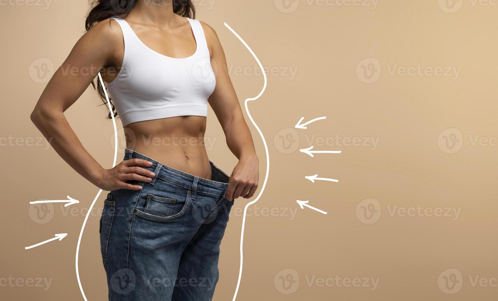 Before and after weight loss concept. Cropped of slender well-fit athletic middle eastern woman wearing white top and oversize jeans, showing thin waist, white shape lines of chubby lady, copy space photo